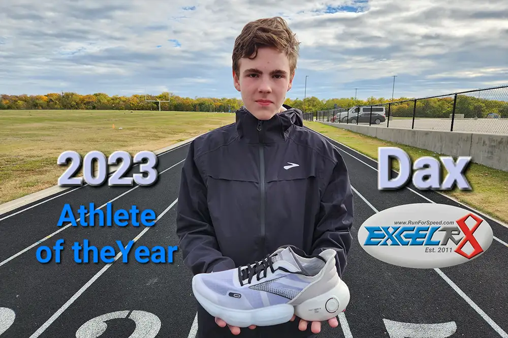 dax run for speed athlete of the year holding his running shoes